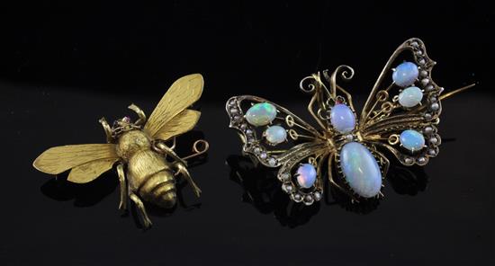 Two early 20th century gold and gem set bug brooches, largest 1.5in.